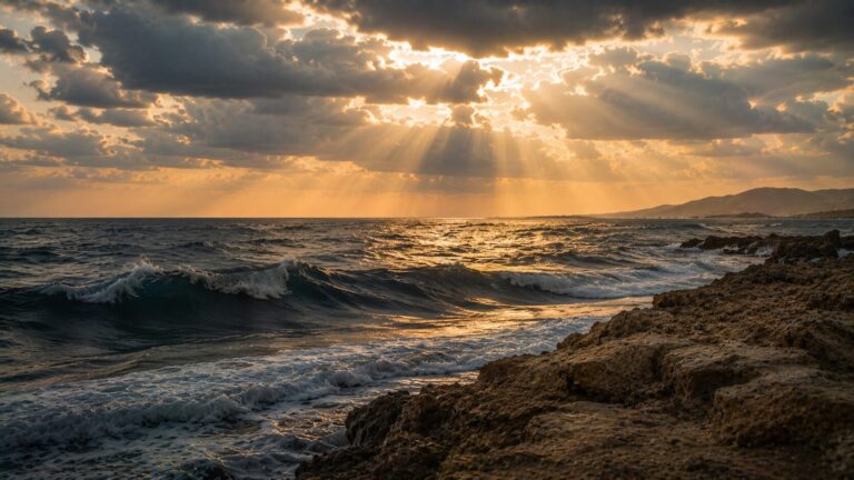 Job 38 Commentary - Featured Image - Golden hour at the rugged coastline